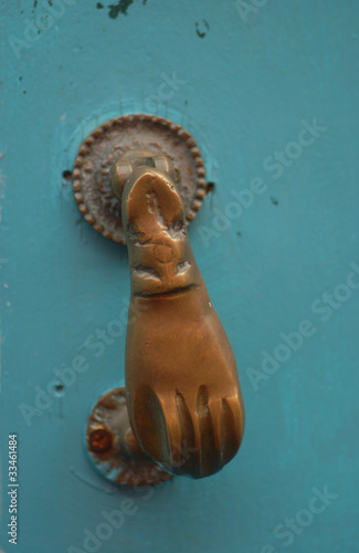Photo: handler of metal on blue wooden door in canary island handler of metal on blue wooden door in canary island