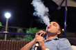 Man smokes hookah