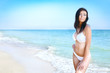 woman in bikini at sea beach