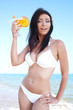 woman in bikini at sea beach