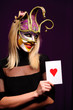 woman in violet mask