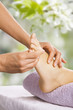 Foot massage in the spa salon
