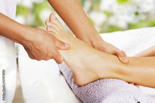 Foto: Foot massage in the spa salon Foot massage in the spa salon
