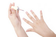Close up view of painting nail on white background