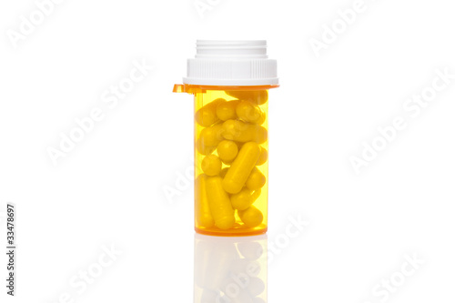 Photo: A yellow pill bottle A yellow pill bottle
