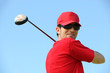 Photos : Golfer head and shoulders smiling.