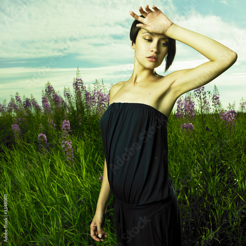 Photo: Girl in flower meadow Girl in flower meadow