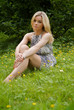 Woman sitting in the grass