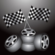 Vector: Racing tires and flags on black backdrop Racing tires and flags on black backdrop