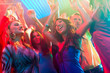 Foto: Party people dancing in disco or club Party people dancing in disco or club