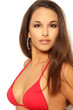 Pretty brunette woman in red bikini top
