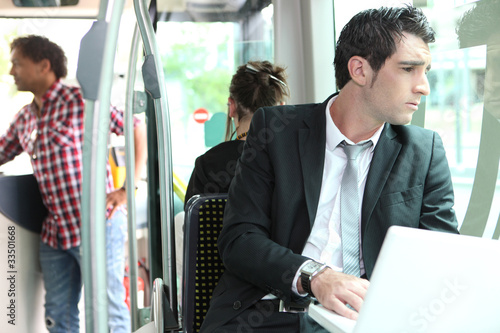 Photo: Businessman on the bus Businessman on the bus