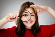 Girl holding magnifying glass Girl holding magnifying glass