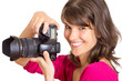 lachende Fotografin mit Kamera