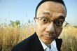 man staring at camera, wide angle lens