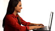 Happy young business woman on laptop computer