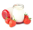 berry yogurt in a glass jar and fresh strawberries berry yogurt in a glass jar and fresh strawberries