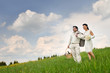 Bride and Groom in Field