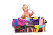 Photo: Baby in clothes and hanger Baby in clothes and hanger