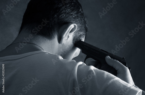 Photo: man with a pistol man with a pistol