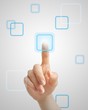 Hand pressing virtual button on futuristic holographic screen