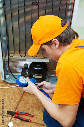 Photo: repair work on fridge appliance repair work on fridge appliance