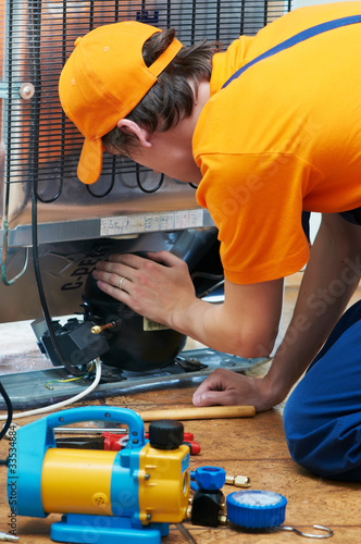 Photo: repair work on fridge appliance repair work on fridge appliance