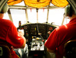 Pilots in the cockpit - old plane