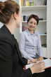 financial advisor or consultant with client