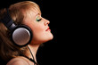 Foto: young women listening to music young women listening to music