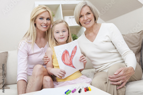 Photo: Mother, Daughter, Grandmother Generations at Home wih Heart Pict Mother, Daughter, Grandmother Generations at Home wih Heart Pict