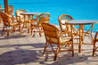 Table and chairs by the pool Table and chairs by the pool