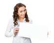 Smiling businesswoman showing blank signboard, isolated