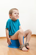 Child sitting on toilet potty