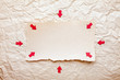 ripped piece of paper with red arrows on old crushed paper backg ripped piece of paper with red arrows on old crushed paper backg