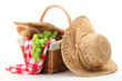 Picnic basket and straw hat