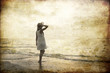 Girl at sea coast.
