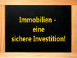 schild, tafel: immobilien, eine sichere investition