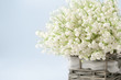 Basket with lilies of the valley