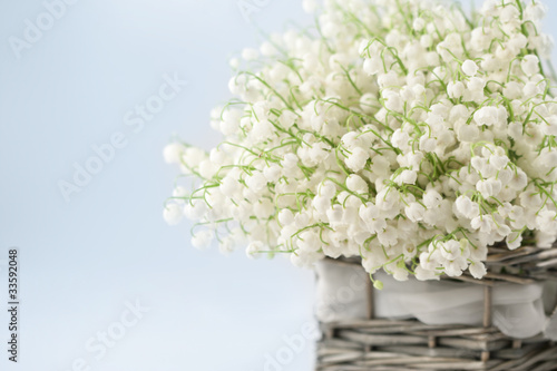 Photo: Basket with lilies of the valley Basket with lilies of the valley