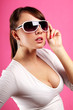 Photo: Young woman wearing sunglasses Young woman wearing sunglasses