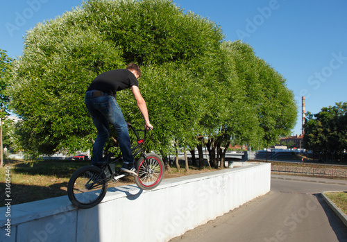 Photo: boy jumping from wall on bmx boy jumping from wall on bmx