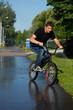 boy riding   on street  bmx