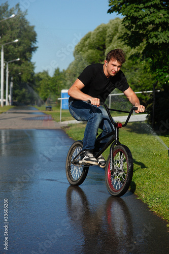 Photo: boy riding on street bmx boy riding on street bmx