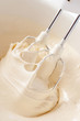 Whipping eggs with electric whisk