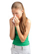 Woman with handkerchief sneezing