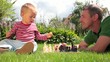 Video: Father and baby playing chess on the grass Father and baby playing chess on the grass
