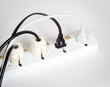 white multiple socket and plugs sideways