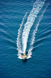 People on the boat racing on the water