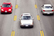 Cars Speeding Along Highway Cars Speeding Along Highway